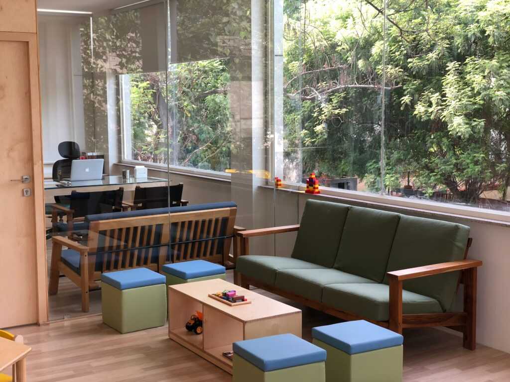 Office space with windows and trees in the background